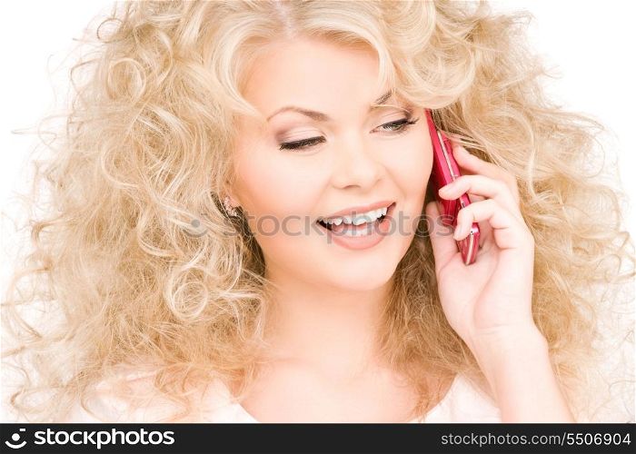portrait of happy woman with pink phone