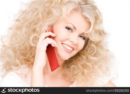 portrait of happy woman with red phone