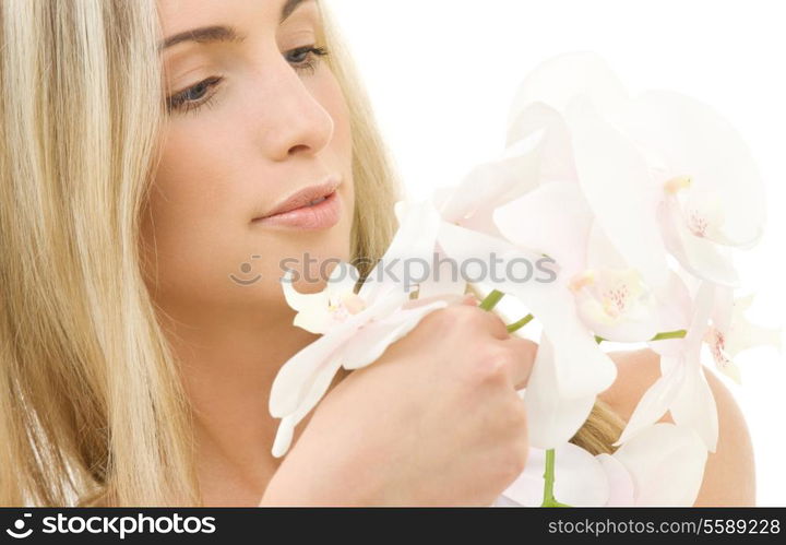 portrait of happy woman with white orchid