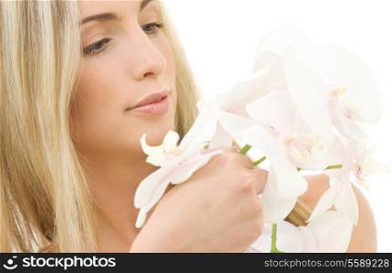 portrait of happy woman with white orchid