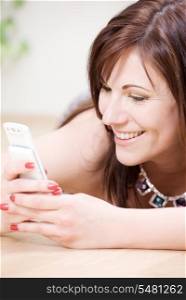 portrait of happy woman with white phone
