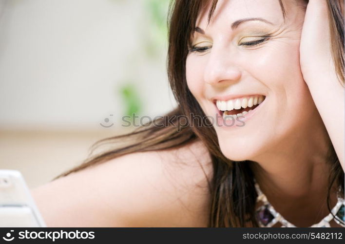 portrait of happy woman with white phone