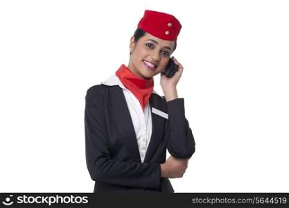 Portrait of happy young airhostess on call isolated over white background