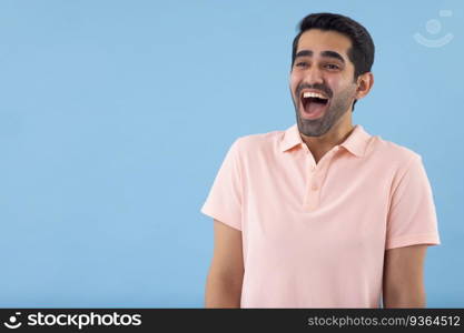 Portrait of happy young man looking elsewhere 