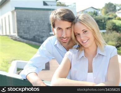 Portrait of happy young property owners