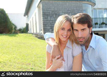 Portrait of happy young property owners