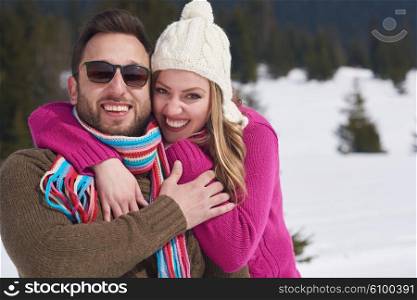 portrait of happy young romantic tourist couple outdoor in nature at winter vacation