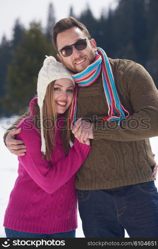 portrait of happy young romantic tourist couple outdoor in nature at winter vacation