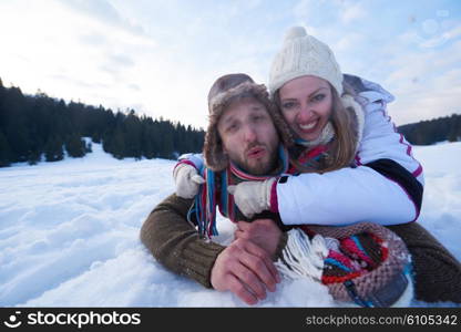 portrait of happy young romantic tourist couple outdoor in nature at winter vacation