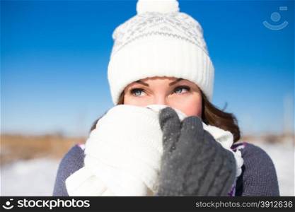 Portrait of happy young woman have fun at beautiful sunny winter day