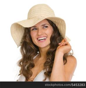 Portrait of happy young woman in hat