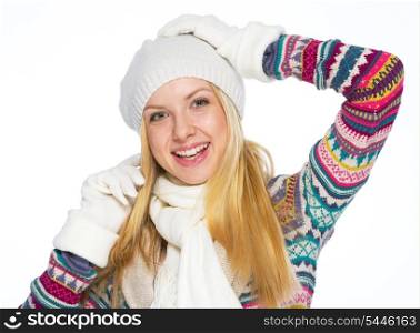 Portrait of happy young woman in winter clothes