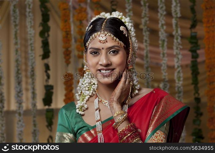 Portrait of happy young woman on her wedding day