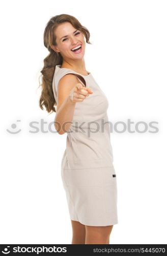 Portrait of happy young woman pointing in camera