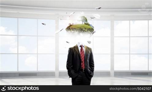 Portrait of headless businessman. Businessman with green eco concept instead of his head
