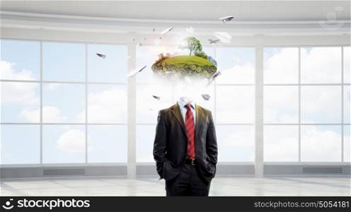 Portrait of headless businessman. Businessman with green eco concept instead of his head