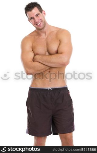 Portrait of healthy muscular guy in shorts