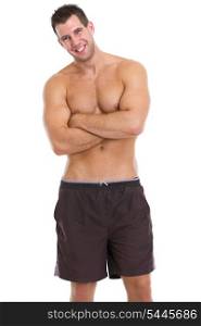 Portrait of healthy muscular guy in shorts
