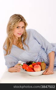 Portrait of healthy young woman with bowl of fresh fruits, concept of dieting, healthy eating & weight loss,
