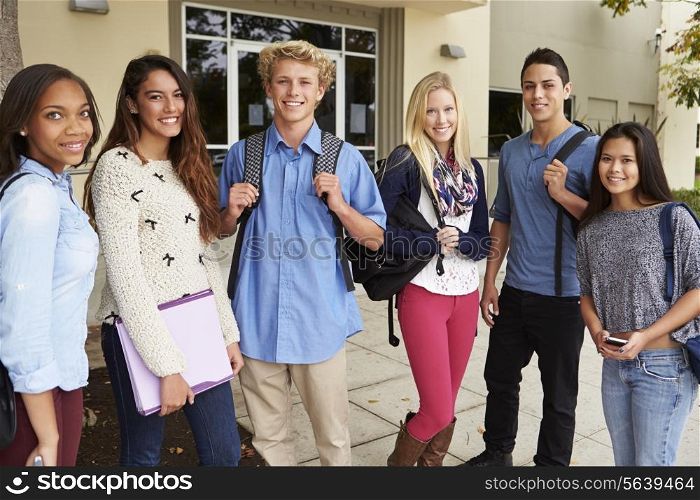Portrait Of High School Students Standing Outside Building