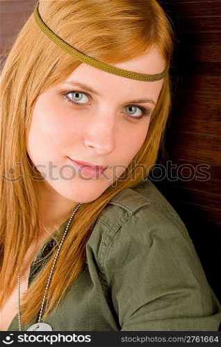 Portrait of hippie young woman in khaki outfit