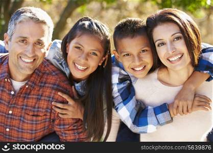 Portrait Of Hispanic Family In Countryside