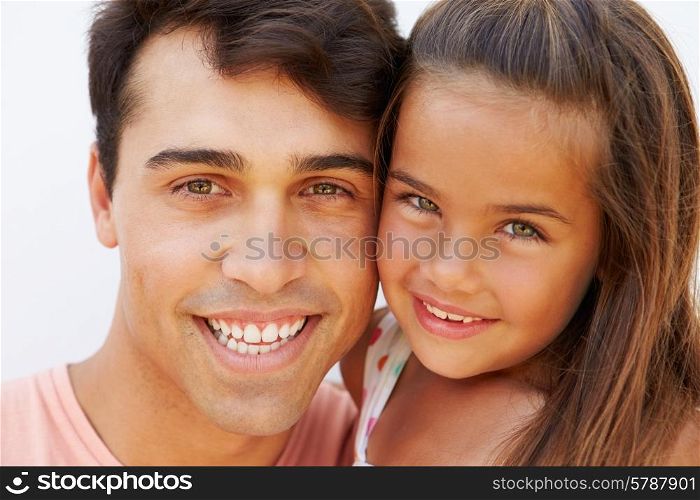 Portrait Of Hispanic Father And Daughter