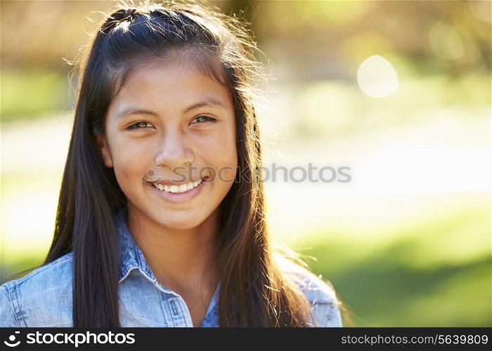 Portrait Of Hispanic Girl In Countryside