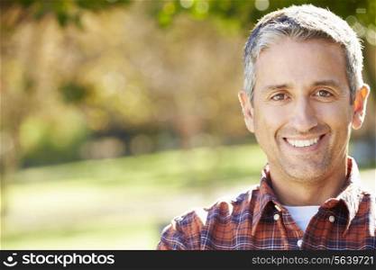 Portrait Of Hispanic Man In Countryside