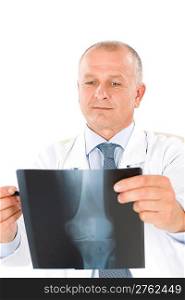 Portrait of hospital professional doctor hold and look at x-ray
