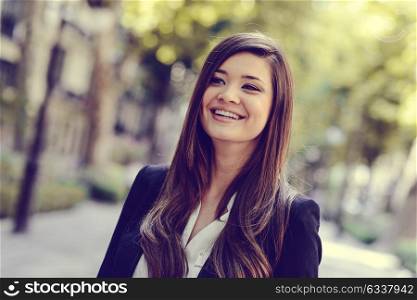 Portrait of japanese business woman in urban background