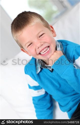 Portrait of kid laughing outloud