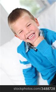 Portrait of kid laughing outloud