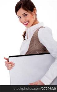 Portrait of lady holding laptop against an isolated background