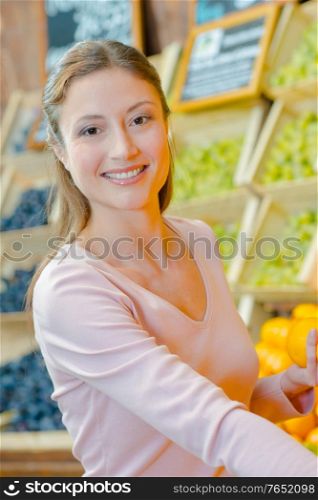 Portrait of lady in greengrocers
