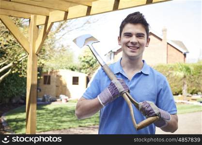 Portrait Of Landscape Gardener Holding Spade
