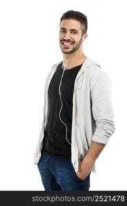 Portrait of latin man smiling and listen music