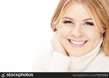 Portrait of laughing blonde in the white sweater, isolated