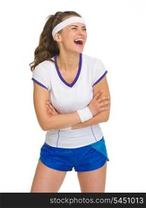 Portrait of laughing female tennis player