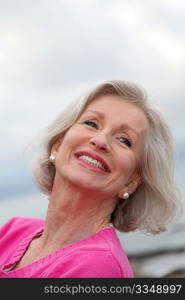 Portrait of laughing senior woman