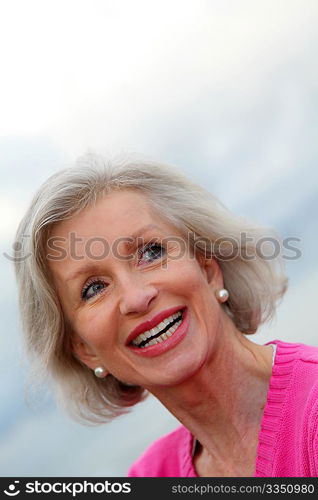 Portrait of laughing senior woman