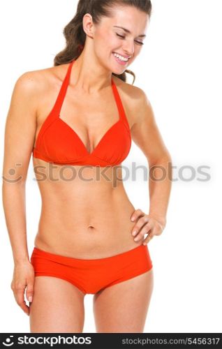 Portrait of laughing young woman in swimsuit