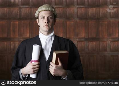 Portrait Of Lawyer In Court Holding Brief And Book