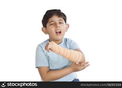 Portrait of little boy with injured arm