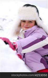 portrait of little girl at ski resort