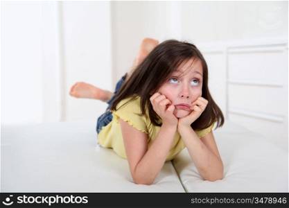 Portrait of little girl with bored expression