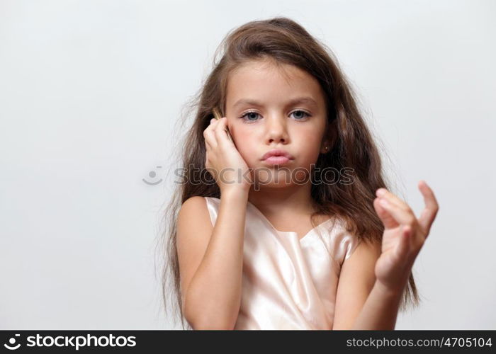 portrait of little girl with extravagant hair on his head