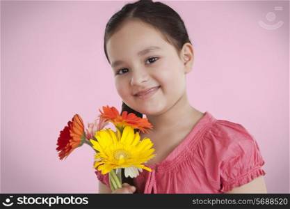 Portrait of little girl with flowers