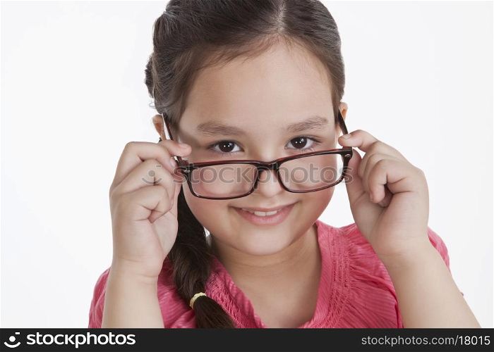 Portrait of little girl with spectacles