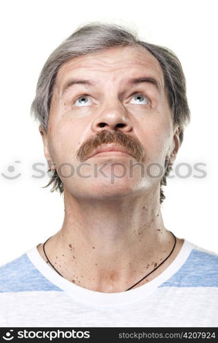 portrait of looking up mature man isolated on white background